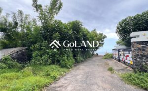 view from road of beachfront plot in Amed