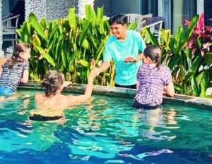 Family in the pool at Salt Resort & Spa